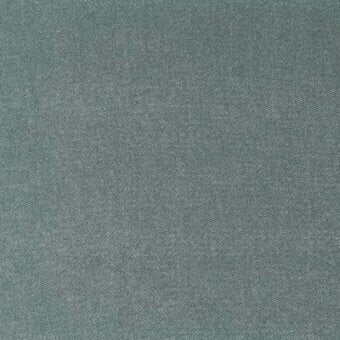 Cool grey-green textured fabric sample displaying a dense, granular surface with subtle tonal variations and a woven-like looped construction.
